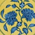 A superb and rare yellow-ground underglaze-blue 'pomegranate' dish, mark and period of Zhengde (1506-1521)