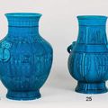 Théodore DECK (1823 - 1891). Deux vases balustre en faïence émaillée turquoise à décor en bas-relief dans le goût chinois.