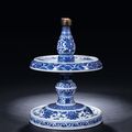 A Blue And White ‘Waves’ Candlestick, Qianlong Period, 1736-1795