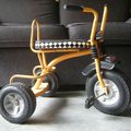 Tricycle vintage jaune