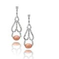 A pair of diamond and conch pearl pendent earrings