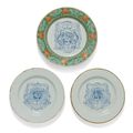 A pair of rare Chinese blue and white armorial plates and a third rare Chinese armorial plate, Kangxi period (1662-1722)