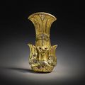 An exceedingly rare gilt and silvered glass-inlaid bird-form fitting, Eastern Zhou - Han dynasty 