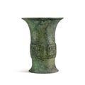 An inscribed archaic bronze ritual wine vessel, zun, Late Shang - Western Zhou dynasty