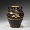 A Cizhou black-glazed carved jar, guan - 12th/13th century
