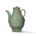 A carved Longquan celadon 'dragon' ewer, early Ming dynasty, 15th century