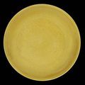 An incised yellow-glazed 'dragon' saucer dish. Daoguang seal mark and of the period