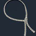 Collier articulé en or gris serti d'une importante chute de 74 diamants «Fancy Yellow» de forme carré,
