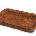 An exceptionally rare Imperial carved yellow and red lacquer 'dragon' tray, Wanli mark cyclically dated Renchen year, 1592