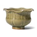 A Yaozhou celadon carved foliate-rimmed jar, Northern Song dynasty (960-1127)