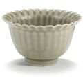 An incised celadon-glazed cup, Qing dynasty, Kangxi period (1662-1722)