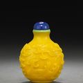 A carved yellow glass snuff bottle, Imperial Palace Workshops, Beijing 1750-1820