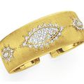 A diamond and gold cuff bracelet, by Buccellati