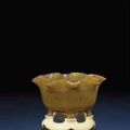 An extremely rare rhinoceros horn floriform cup. Qianlong incised four-character mark and of the period (1736-1795