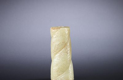 A pale green jade bead, Western Zhou Dynasty (1050-771 BC)