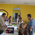 DISTRIBUTION DES FOURNITURES SCOLAIRES