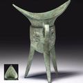 A rare bronze tripod ritual wine vessel, jiao, Late Shang dynasty, 11th century BC 
