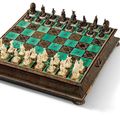 A silver-inlaid, tortoiseshell-veneered, carved ivory and ebonised wood chess set, Augsburg, circa 1705-1709