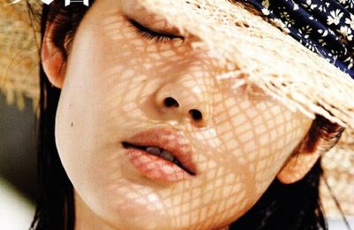 Editorial: 'A Place In The Sun' with Liu Wen by Hans Feurer for Vogue China, June 2011