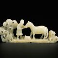 A pale celadon jade carving of a horse and groom, Qing dynasty, 18th century