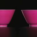 An exceptionally fine and rare pair of polychrome enamelled ruby-back wine cups, marks and period of Yongzheng (1723-1735)