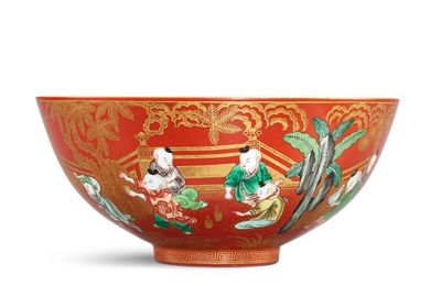A large coral-ground famille-verte and gilt-decorated 'boys' bowl, Seal mark and period of Jiaqing (1796-1820)