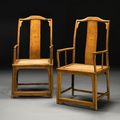 A pair of huanghuali continous yokeback armchairs (nanguanmaoyi), Ming dynasty, 17th century