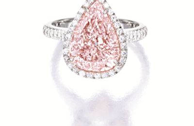 Fancy light purplish pink diamond and diamond ring