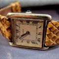 CARTIER, montre de dame en vermeil, modèle Tank mécanique