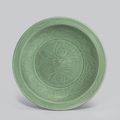 A Longquan celadon  'Lotus spray' charger, Ming dynasty, 15th century
