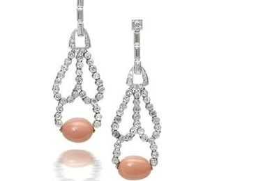 A pair of diamond and conch pearl pendent earrings