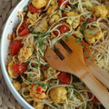 SPAGHETTIS avec CHOU FLEUR ÉPICÉ, TOMATES CONFITES, CÂPRES & AMANDES