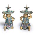 A very rare pair of cloisonné enamel and gilt-bronze kneeling 'foreigner' candlesticks, Kangxi period (1662-1722)