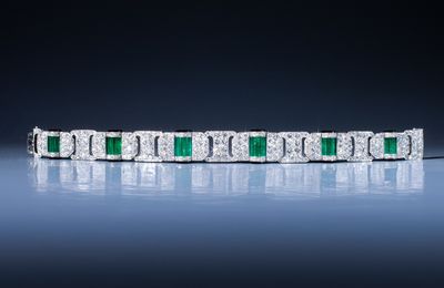 An exceptional Art Deco emerald, black enamel and diamond bracelet by Chaumet, Paris, 1930