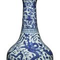 A finely painted blue and white 'dragon' garlic-mouth bottle vase, Wanli mark and period (1573-1620)