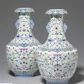 A fine and rare pair of famille rose vases. Daoguang seal marks in underglaze blue and of the period (1821-1850) 