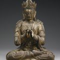 A rare carved wood figure of Vairocana, Early Ming dynasty