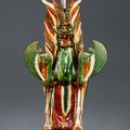 A sancai-glazed figure of a tomb guardian, Tang dynasty (618-907)