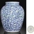 A very rare large late Ming blue and white reverse-decorated 'hundred cranes' jar. Wanli six-character mark and of the period 