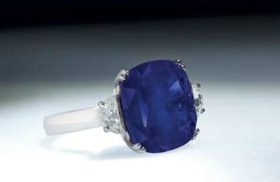An important 14.55 carats Kashmir cushion-shaped sapphire and diamond ring