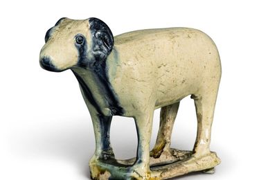 A rare blue-splashed pottery figure of a ram, Tang dynasty