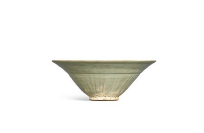 A large moulded Northern celadon 'peony' bowl, Jin dynasty