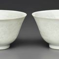 A pair of glazed bowls with cut-out decoration, 18th century