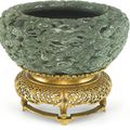 A rare spinach-green jade alms bowl, Qing dynasty, Qianlong period (1736-1795)