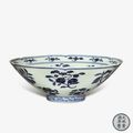 A fine blue and white lobed 'fruit and flower' bowl, Xuande mark and period (1426–1435)