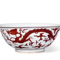 A Large Iron-Red Glazed ‘Dragon’ Bowl, Mark And Period Of Jiajing (1522-1566)