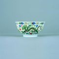 A Chinese Imperial porcelain wucai dragon and phoenix bowl. Six character sealmark of Jiaqing and of the period, 1796-1820.