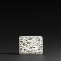 An openwork white jade dragon plaque, Early Ming Dynasty, 15th Century