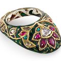 A Mughal gem-set and enamelled gold archer's ring, North India, circa 17th century 
