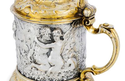 A Baroque part gilt cast and chased silver tankard, Hamburg, 3rd quarter of 17th century, maker's mark of Heinrich Lambrecht II